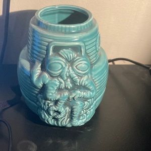 The Fly Tiki Muglet